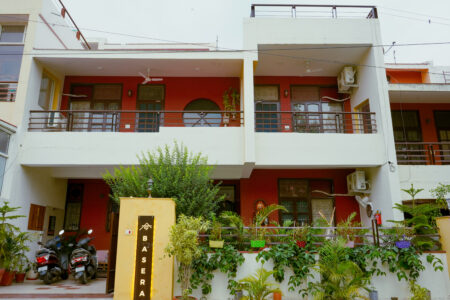 Entrance of The Basera villa with secure gate & signboard