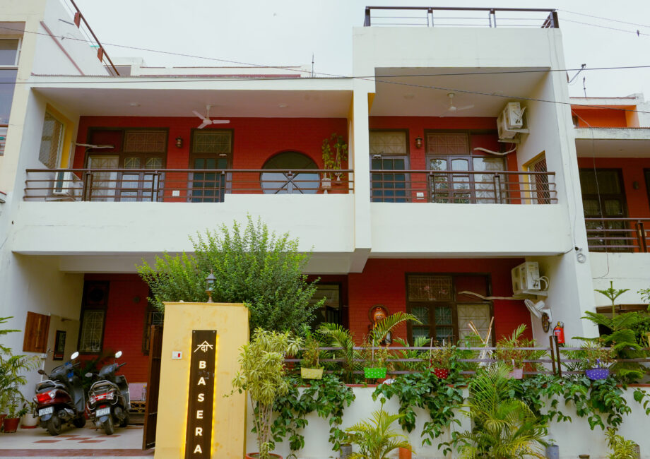 Entrance of The Basera villa with secure gate & signboard