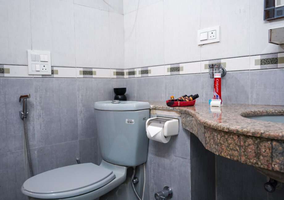 Bathroom counter with toiletries and clean finishes