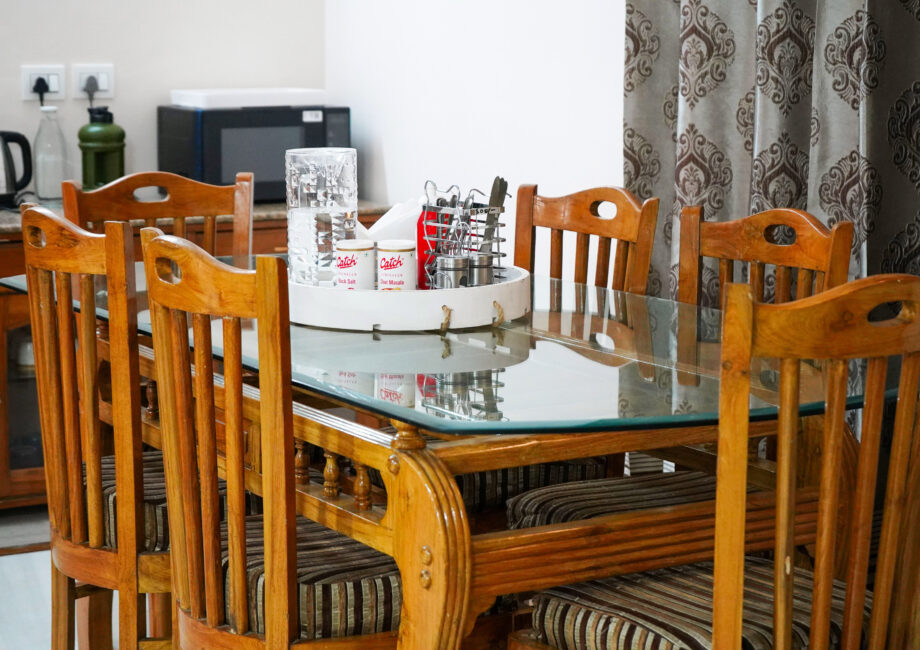Close tabletop of dining table sitting in dining area of the house