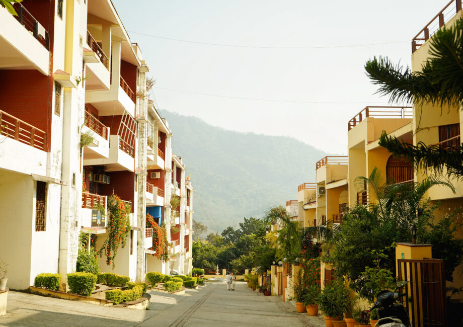 Quiet residential street inside the society with hills in background