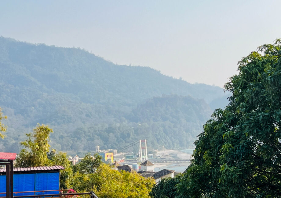 Mountain range view with glimpses of Rishikesh town and river from the terrace.